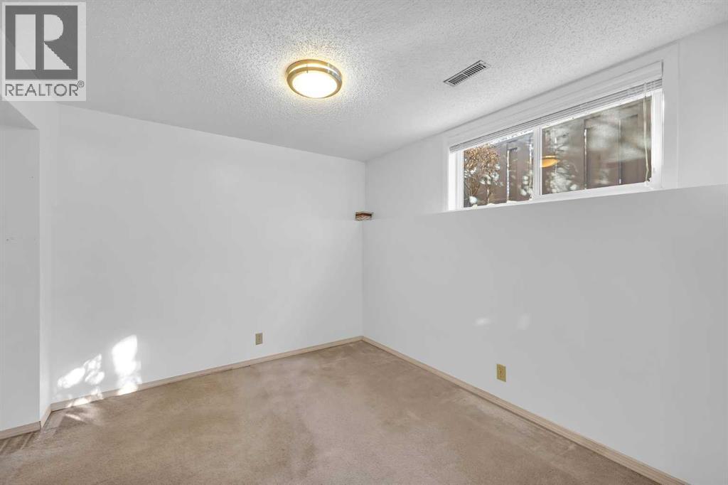 40 Cedargrove Way SW, Calgary, Alberta  T2W 4V1 - Photo 42 - A2292650
