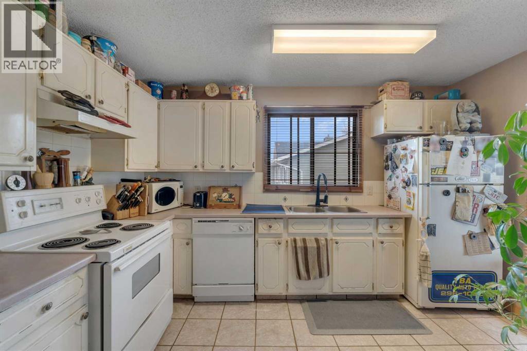 115 Deerfield Drive SE, Calgary, Alberta  T2J 6T9 - Photo 10 - A2295370