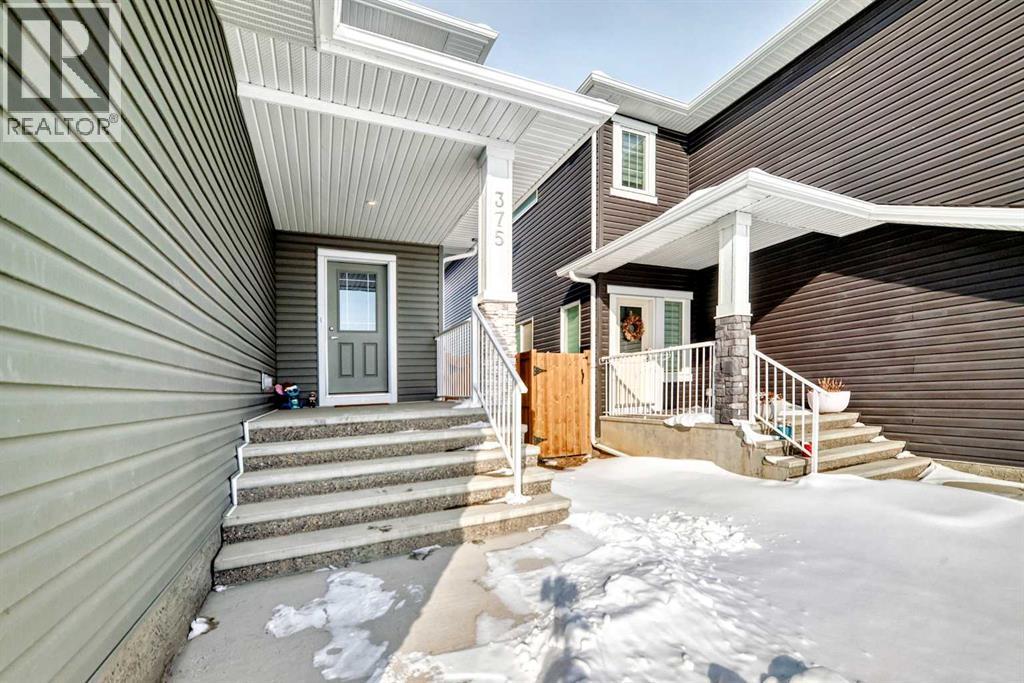 375 Dawson Harbour Court, Chestermere, Alberta  T1X 1Z6 - Photo 4 - A2288137