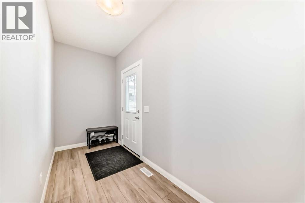 375 Dawson Harbour Court, Chestermere, Alberta  T1X 1Z6 - Photo 5 - A2288137