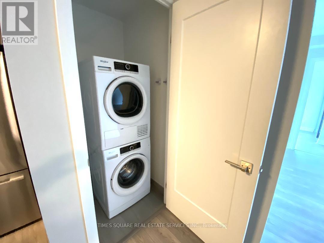 909 - 18 Water Walk Drive, Markham, Ontario  L3R 6L5 - Photo 17 - N12907136