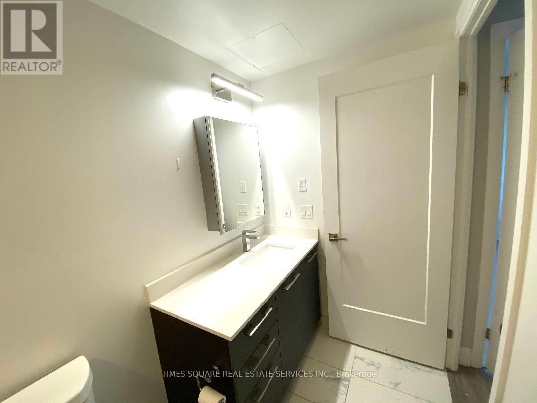 909 - 18 Water Walk Drive, Markham, Ontario  L3R 6L5 - Photo 29 - N12907136