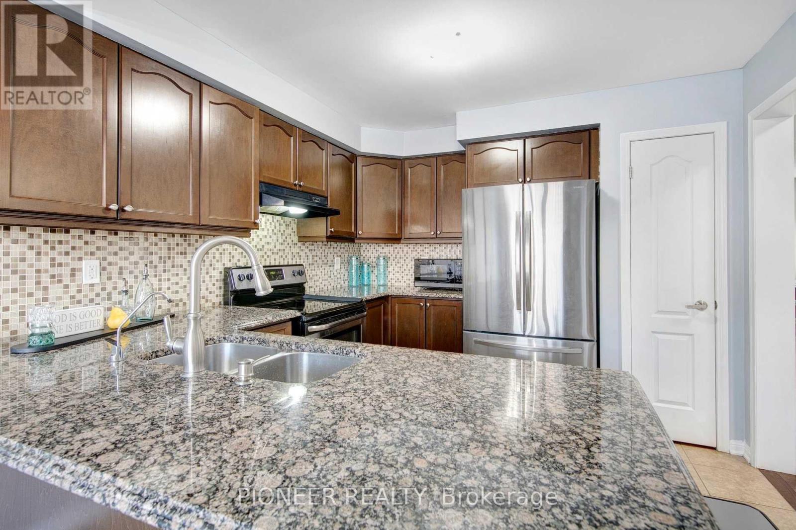 15 Colonel Frank Ching Crescent, Brampton, Ontario  L6Y 5W6 - Photo 8 - W12907316