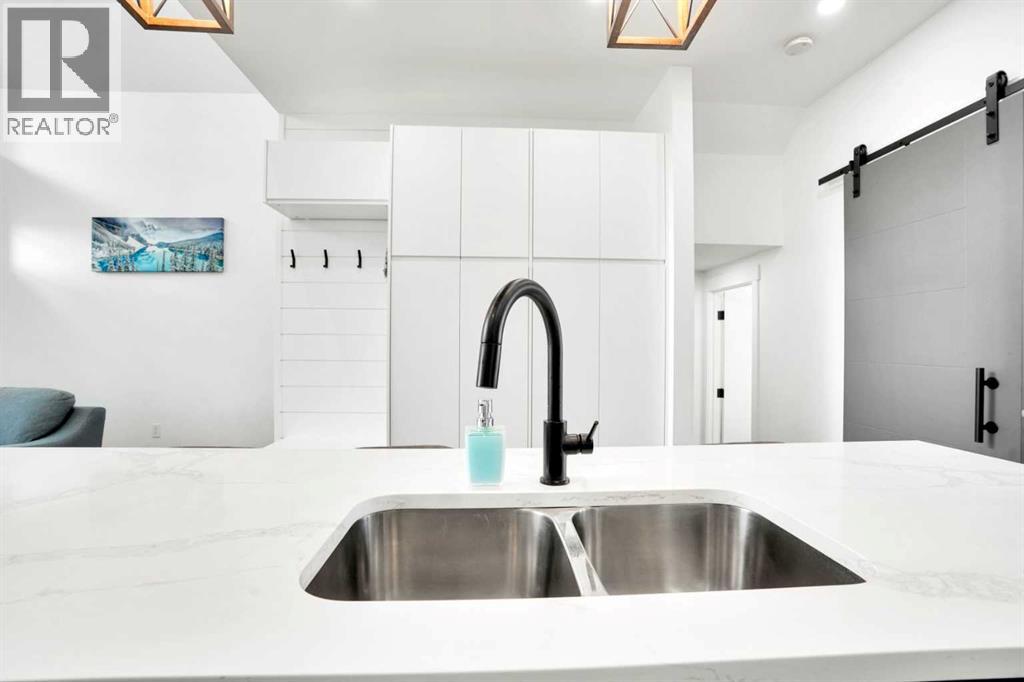 44 Cottageclub Lane, Rural Rocky View County, Alberta  T4C 1B1 - Photo 11 - A2295326