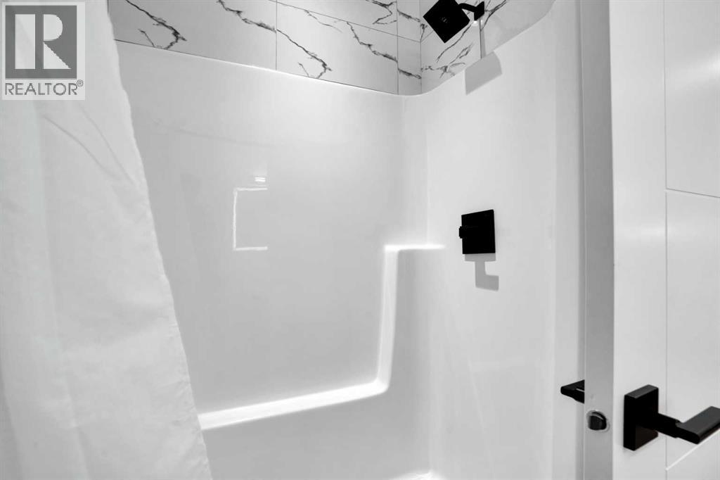 44 Cottageclub Lane, Rural Rocky View County, Alberta  T4C 1B1 - Photo 20 - A2295326