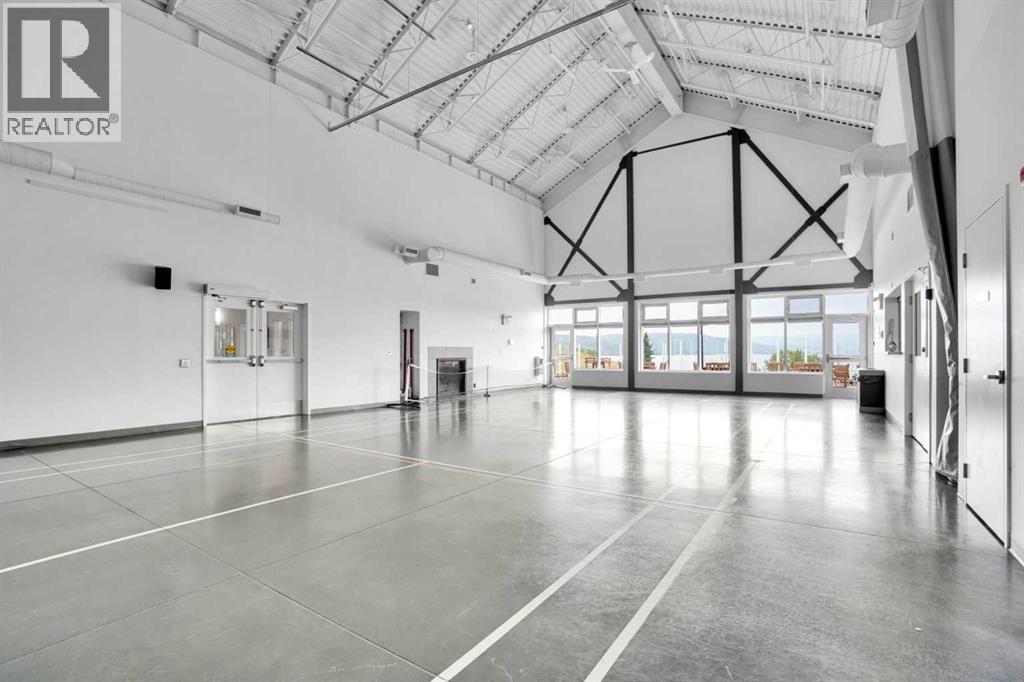 44 Cottageclub Lane, Rural Rocky View County, Alberta  T4C 1B1 - Photo 31 - A2295326