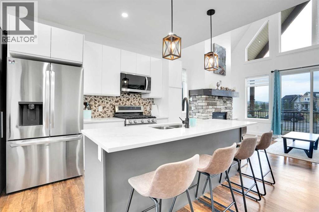 44 Cottageclub Lane, Rural Rocky View County, Alberta  T4C 1B1 - Photo 9 - A2295326