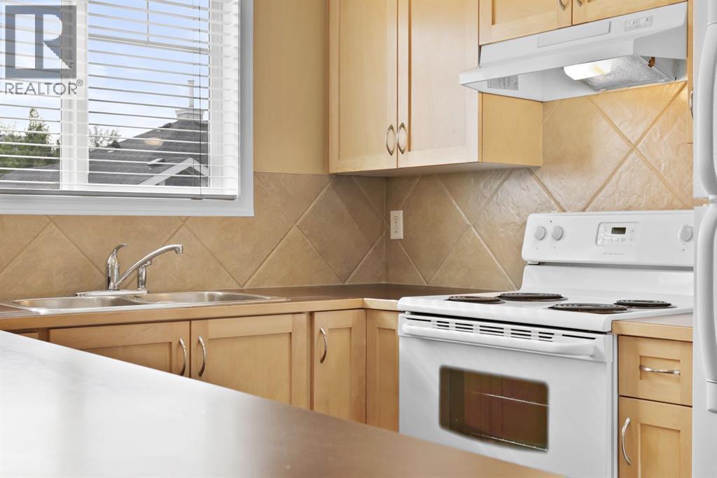 8318, 70 Panamount Drive Nw, Calgary, Alberta  T3K 6G7 - Photo 4 - A2295363