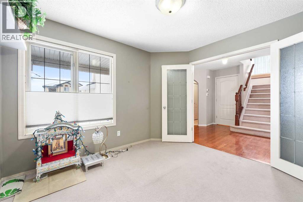 69 Hampstead Gardens Nw, Calgary, Alberta  T3A 5Y5 - Photo 3 - A2294451