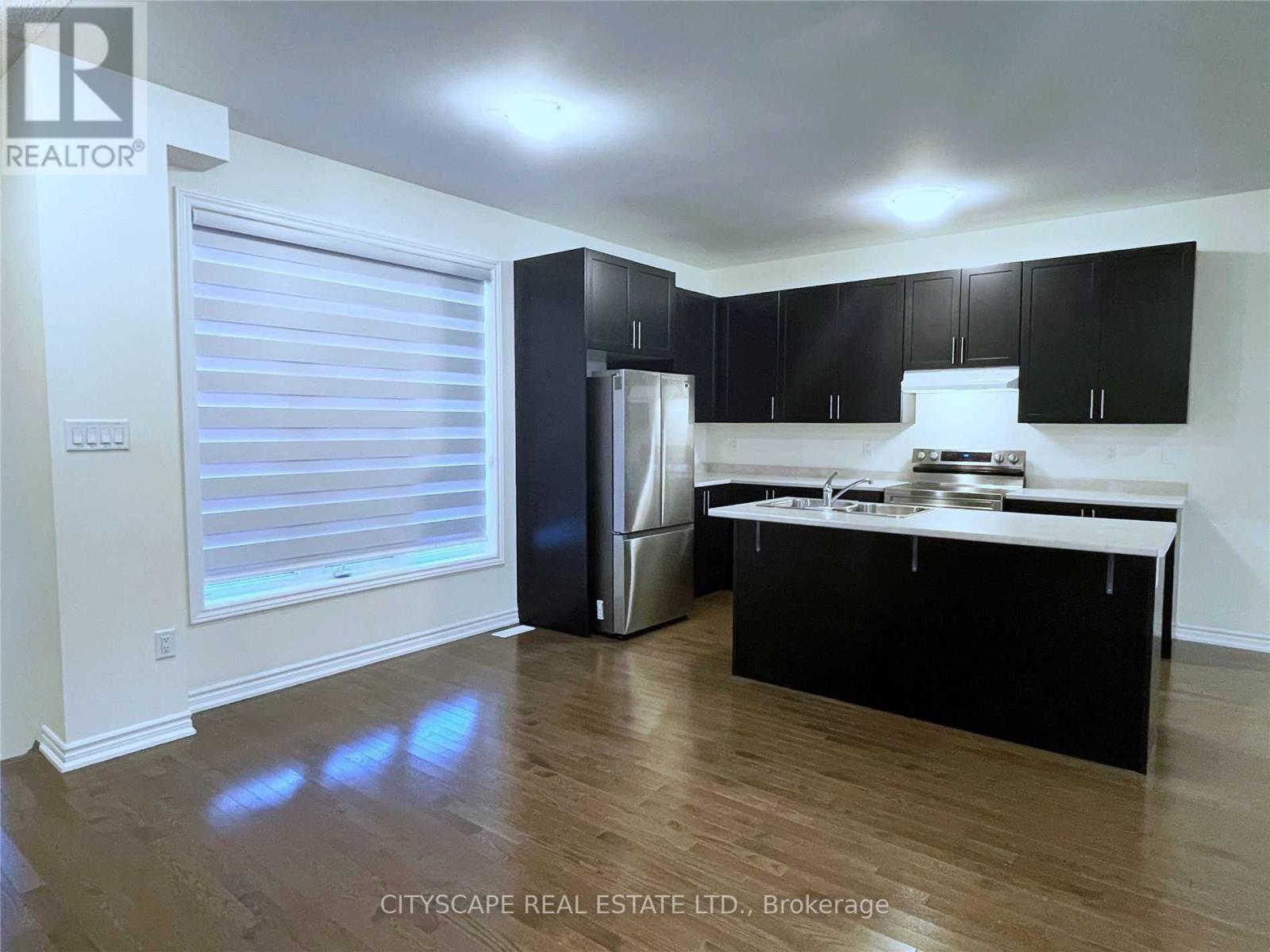 253 Clockwork Drive, Brampton, Ontario  L7A 5C7 - Photo 7 - W12907336