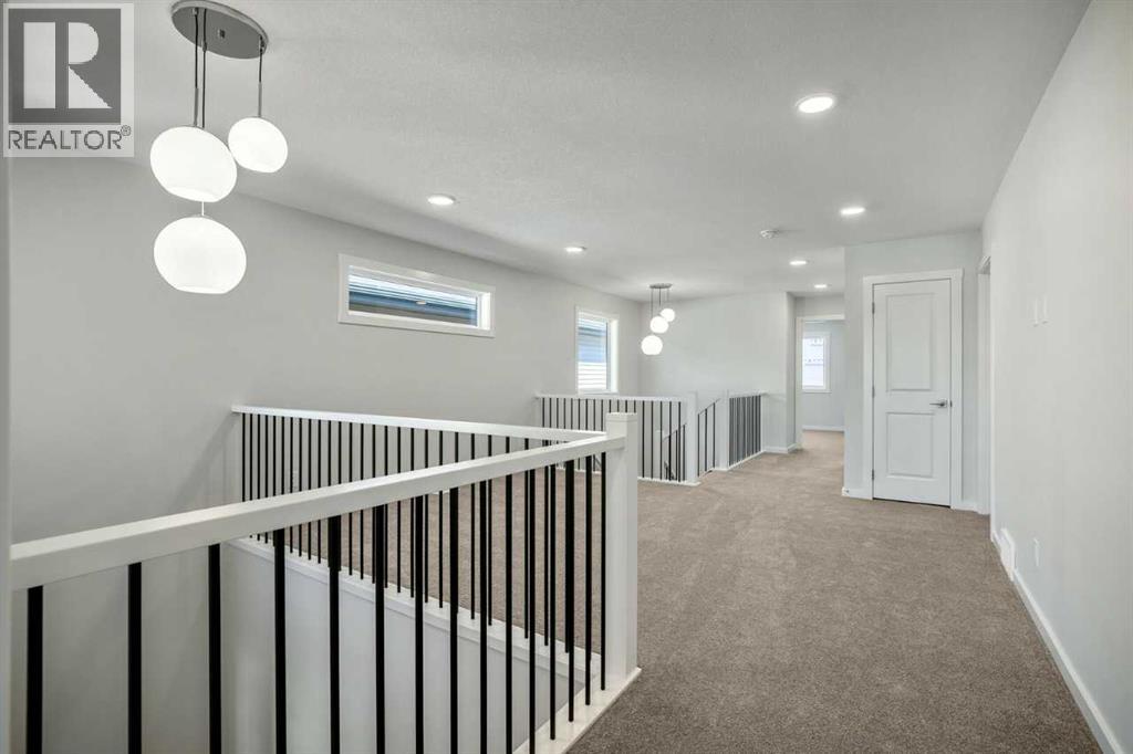 11 Heritage Link, Cochrane, Alberta  T4C 2J8 - Photo 9 - A2275697