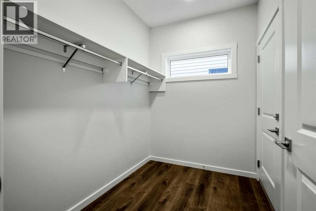 11 Heritage Link, Cochrane, Alberta  T4C 2J8 - Photo 6 - A2275697