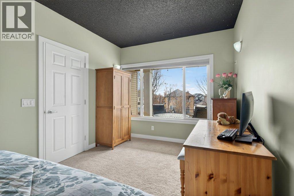 311 Crystal Shores View, Okotoks, Alberta  T1S 2H9 - Photo 32 - A2294700