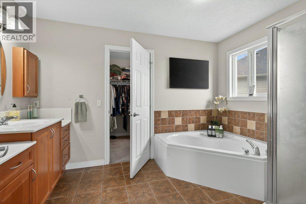 311 Crystal Shores View, Okotoks, Alberta  T1S 2H9 - Photo 21 - A2294700