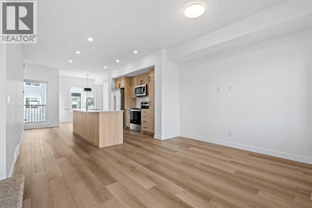 1007, 25 Wildwoods Court Sw, Airdrie, Alberta  T4B 5V7 - Photo 3 - A2283457