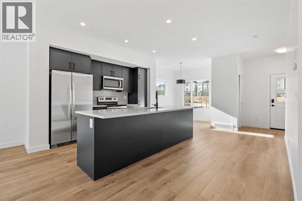 1115, 25 Wildwoods Court Sw, Airdrie, Alberta  T4B 5V7 - Photo 5 - A2283791