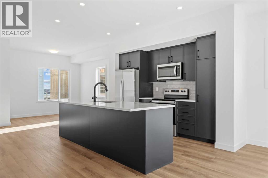 1115, 25 Wildwoods Court Sw, Airdrie, Alberta  T4B 5V7 - Photo 4 - A2283791