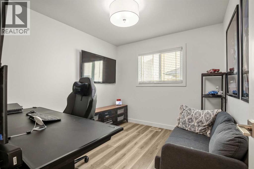 236 Mt Sparrowhawk Place SE, Calgary, Alberta  T2Z 2G8 - Photo 4 - A2294294