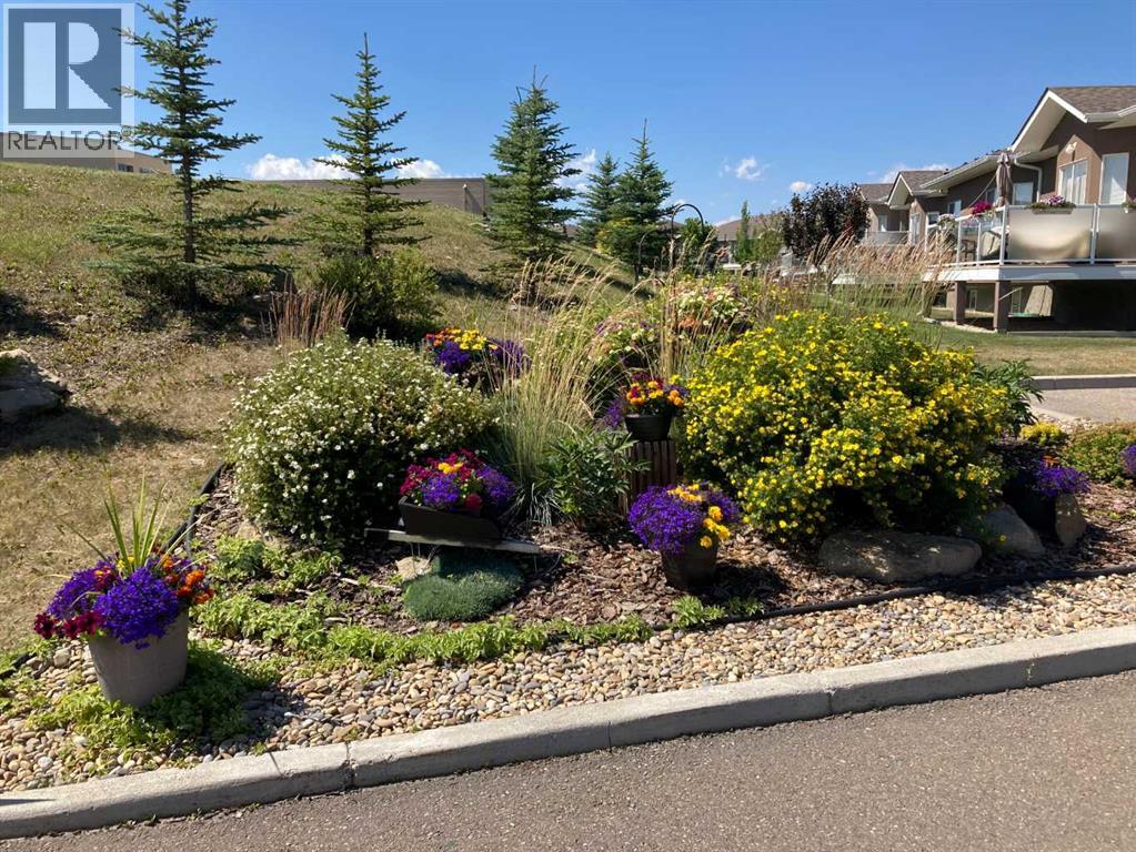 117 River Heights View, Cochrane, Alberta  T4C 0E6 - Photo 38 - A2295228