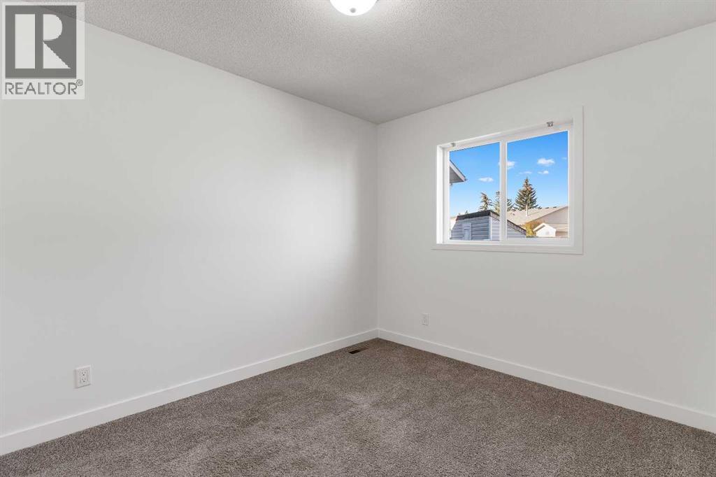 2 West Barrett Place, Cochrane, Alberta  T4C 1J5 - Photo 28 - A2265976