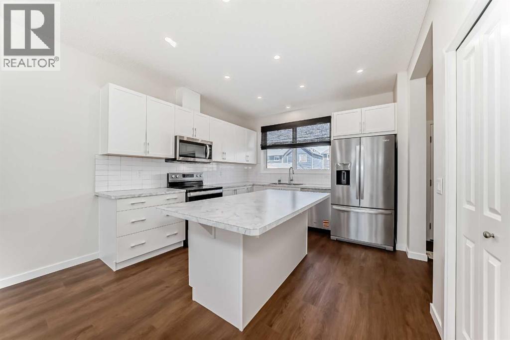 80 Magnolia Way SE, Calgary, Alberta  T3M 2W7 - Photo 6 - A2291460