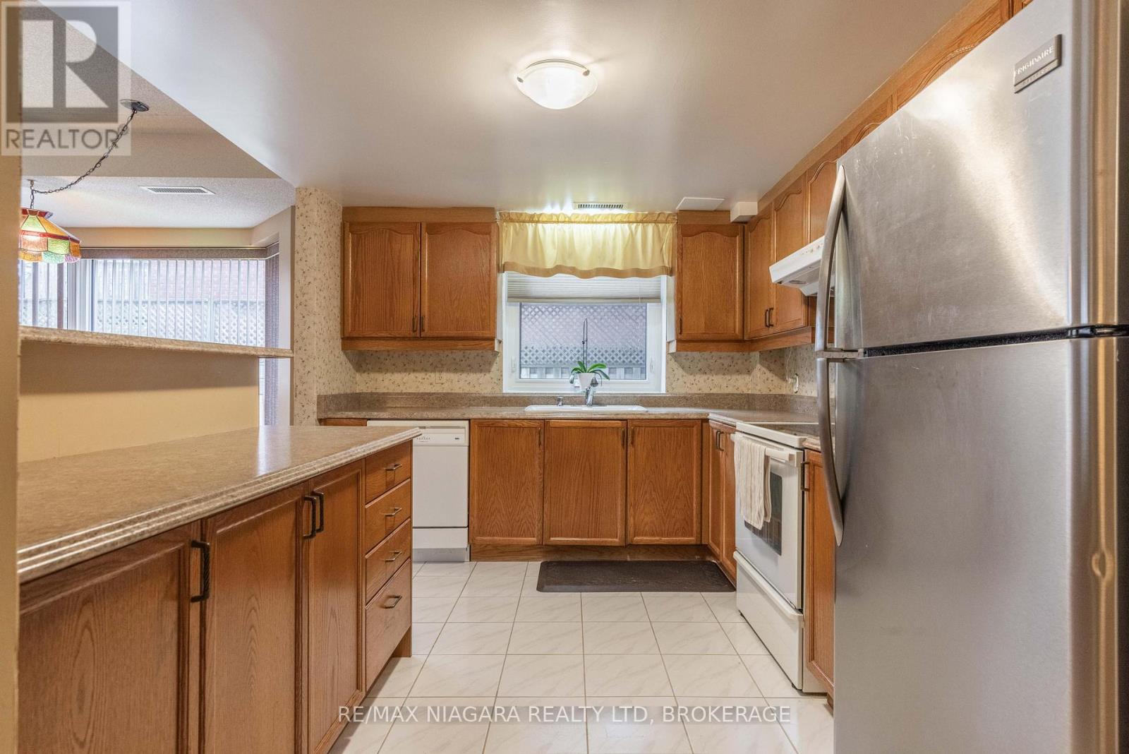 102 - 6704 Thorold Stone Road, Niagara Falls (Morrison), Ontario  L2J 1B3 - Photo 5 - X12908798