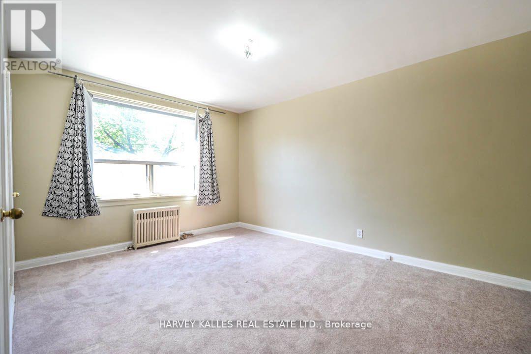 90 Trethewey Drive, Toronto, Ontario  M6M 4B4 - Photo 8 - W12908662