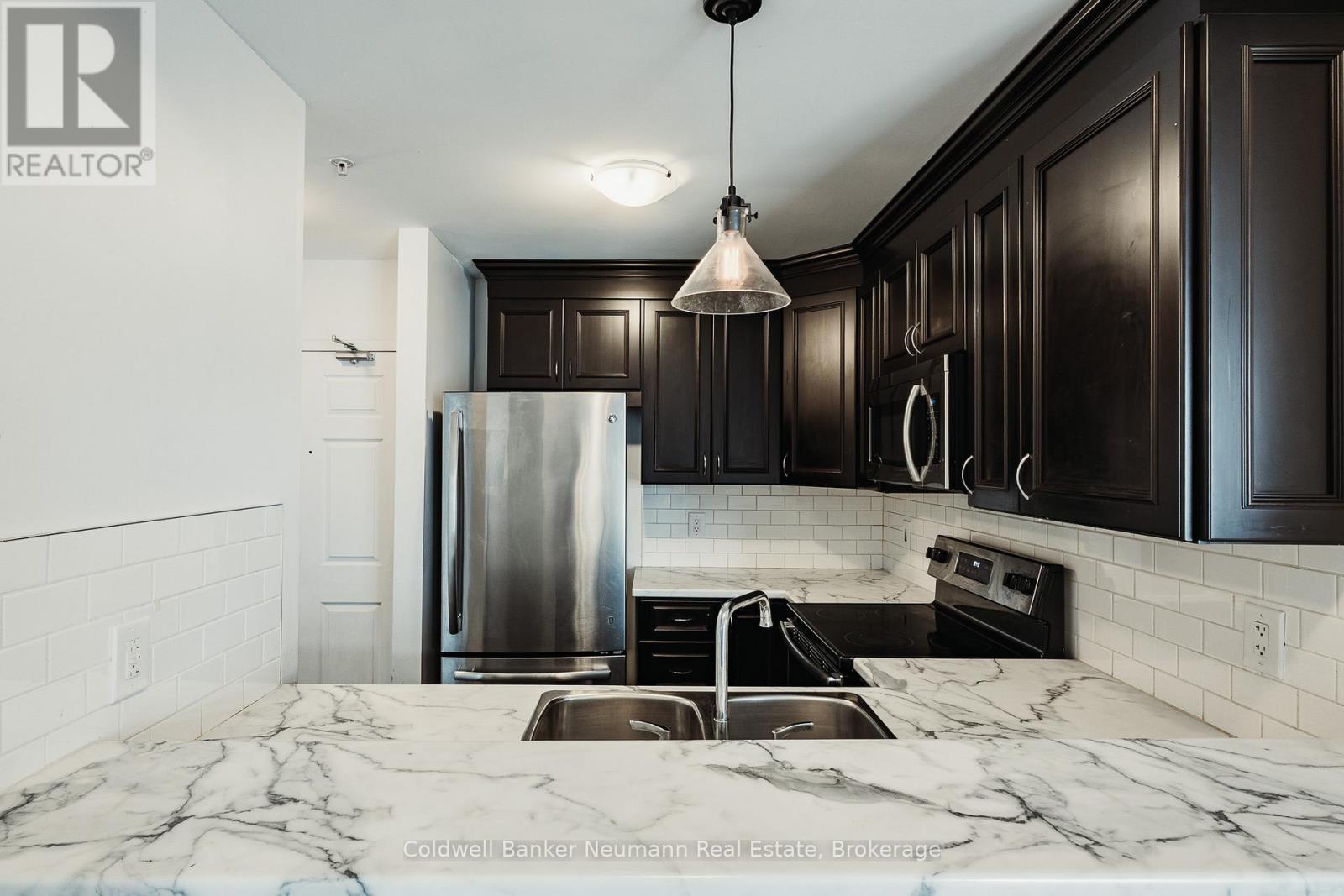 312 - 2 Colonial Drive, Guelph (Pineridge/westminster Woods), Ontario  N1L 0K8 - Photo 3 - X12909130