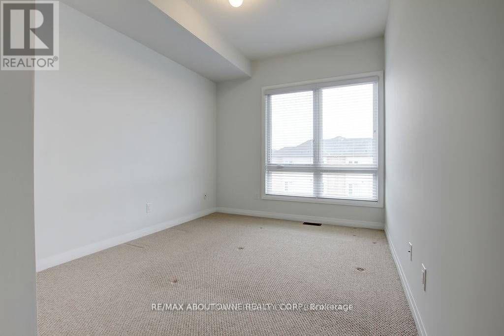 203 - 1202 Main Street E, Milton, Ontario  L9T 9K8 - Photo 13 - W12909528