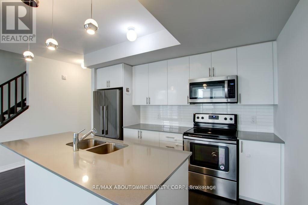 203 - 1202 Main Street E, Milton, Ontario  L9T 9K8 - Photo 6 - W12909528