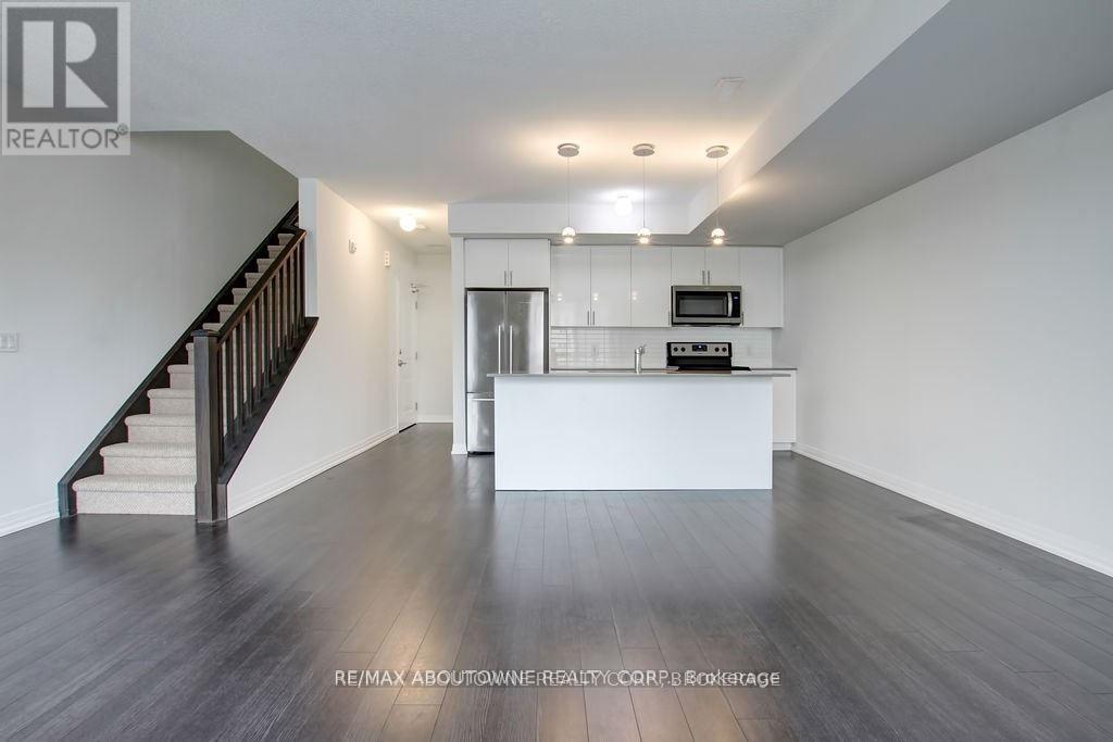 203 - 1202 Main Street E, Milton, Ontario  L9T 9K8 - Photo 7 - W12909528