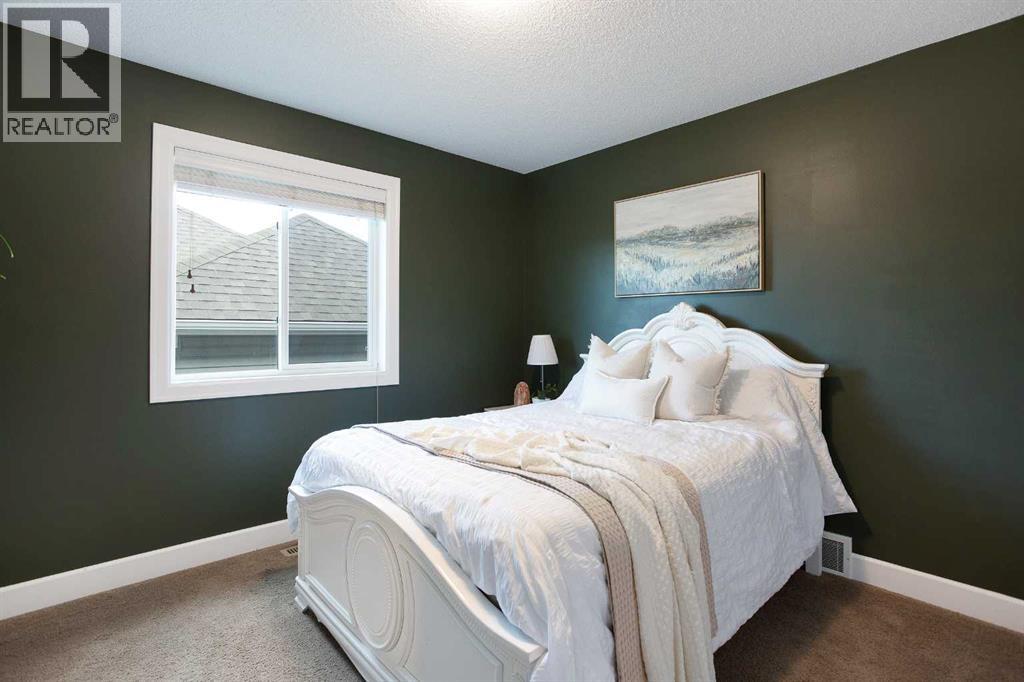 2016 Windsong Drive SW, Airdrie, Alberta  T4B 0P6 - Photo 23 - A2293326