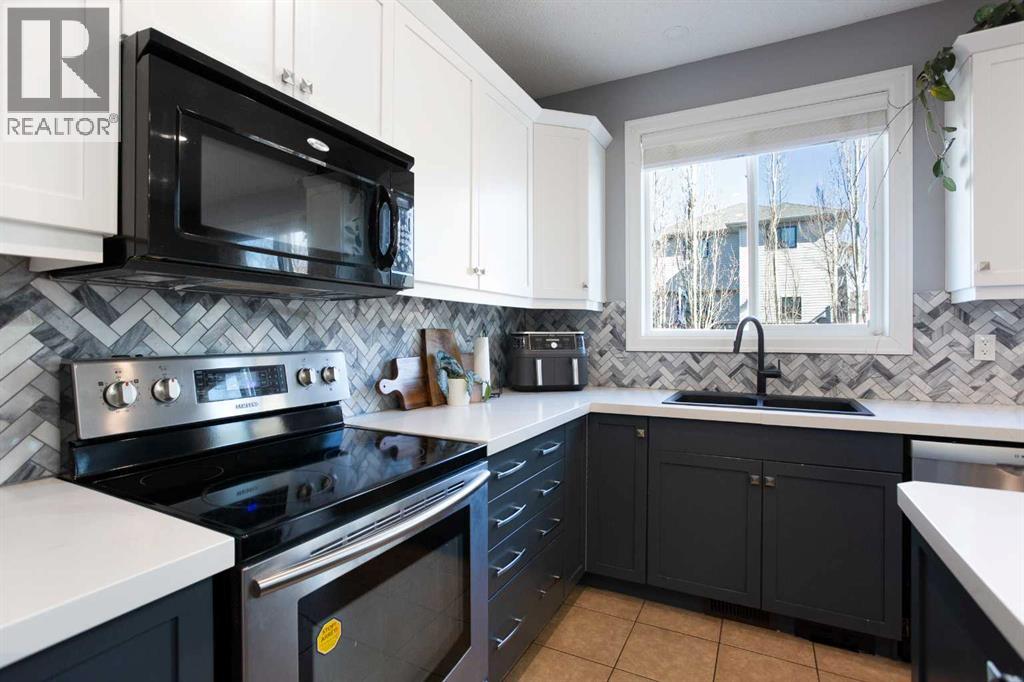 2016 Windsong Drive SW, Airdrie, Alberta  T4B 0P6 - Photo 5 - A2293326