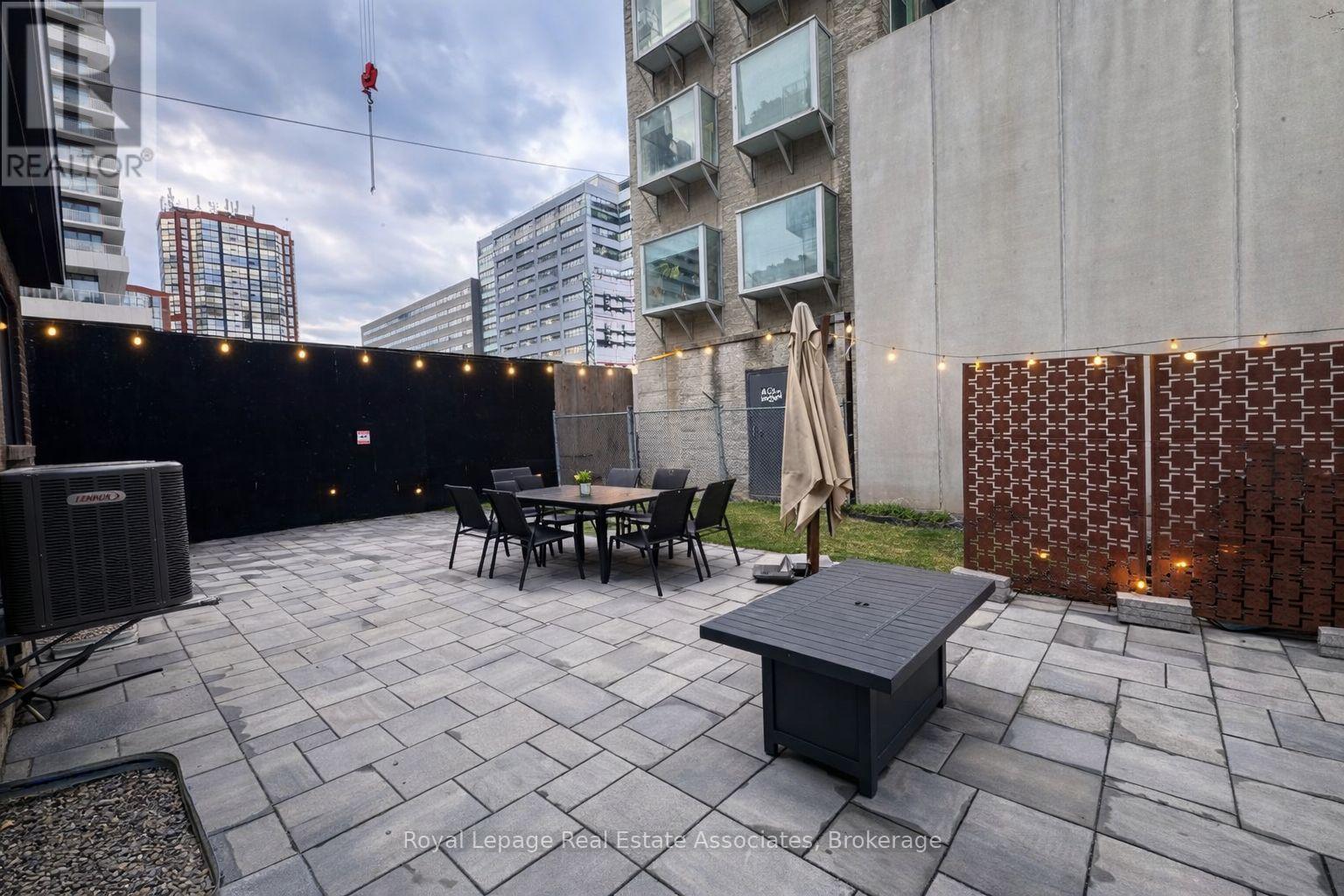 Rear Yard - 56 Stewart Street, Toronto (Waterfront Communities), Ontario  M5V 1H6 - Photo 3 - C12909630