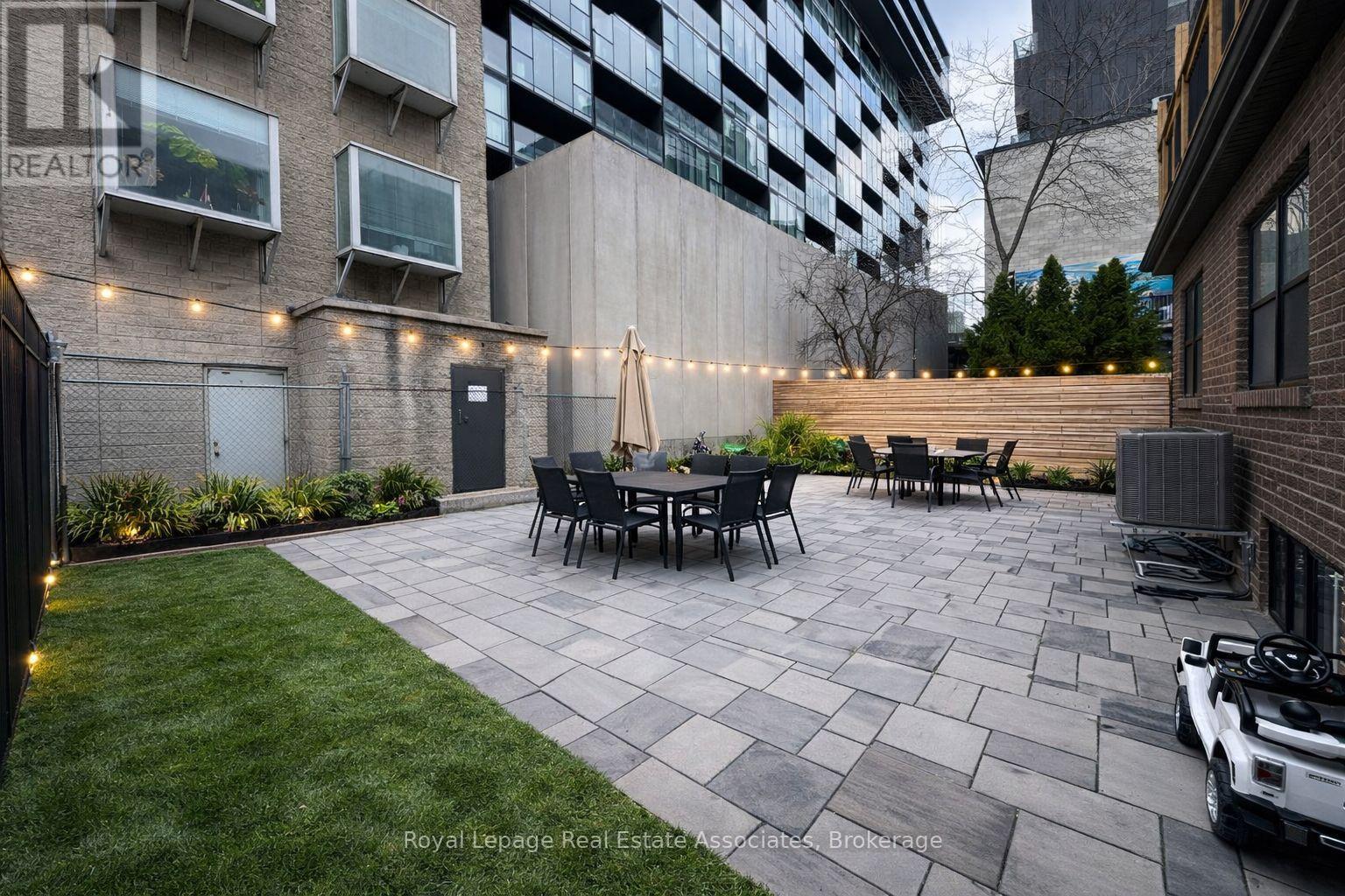 Rear Yard - 56 Stewart Street, Toronto (Waterfront Communities), Ontario  M5V 1H6 - Photo 4 - C12909630