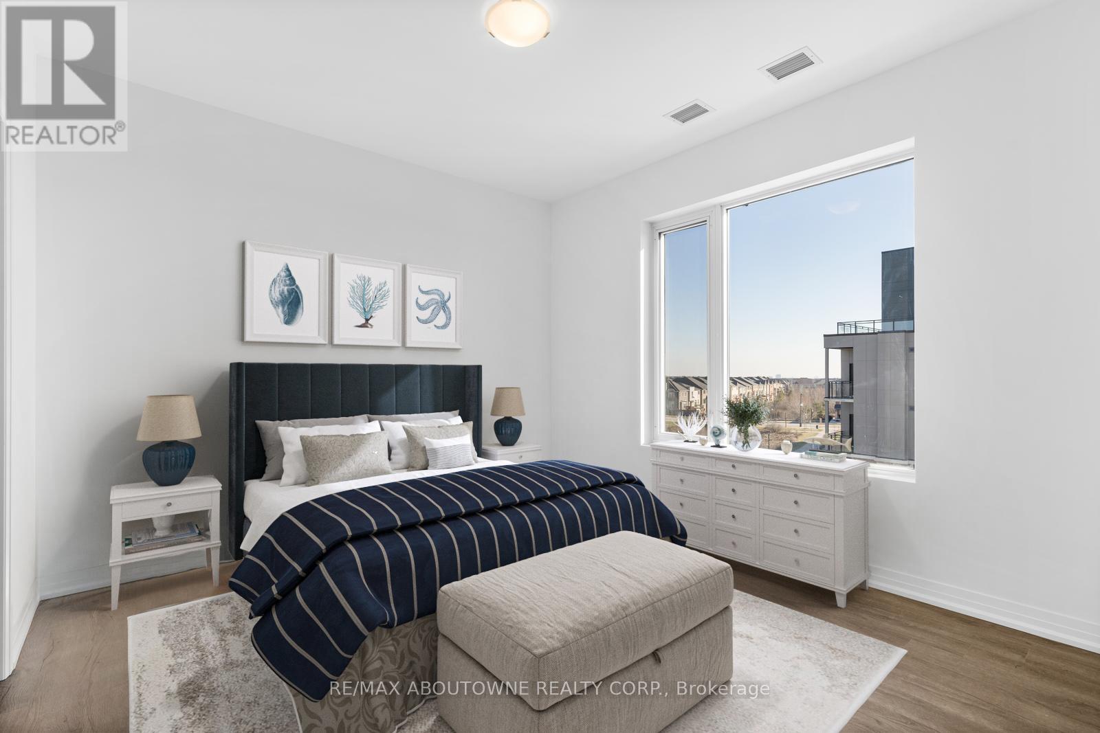 403 - 3285 Carding Mill Trail, Oakville, Ontario  L6M 1S1 - Photo 4 - W12909808