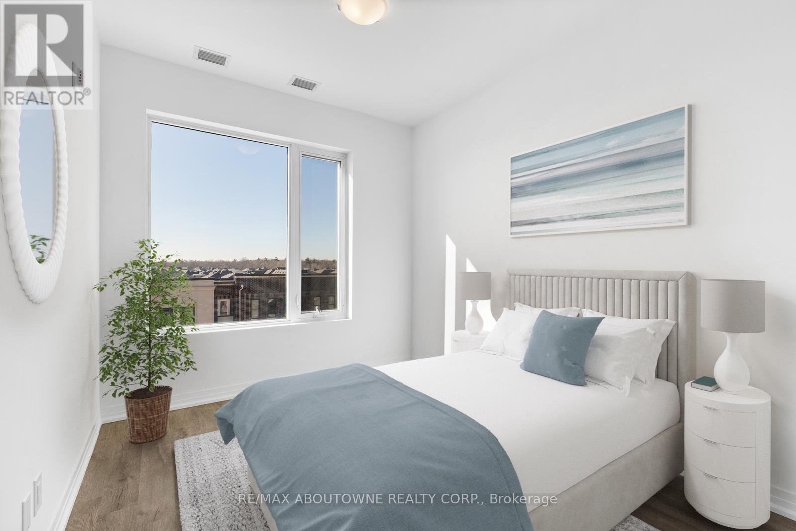 403 - 3285 Carding Mill Trail, Oakville, Ontario  L6M 1S1 - Photo 5 - W12909808