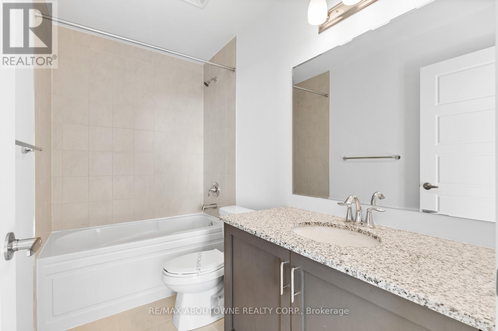 403 - 3285 Carding Mill Trail, Oakville, Ontario  L6M 1S1 - Photo 6 - W12909808