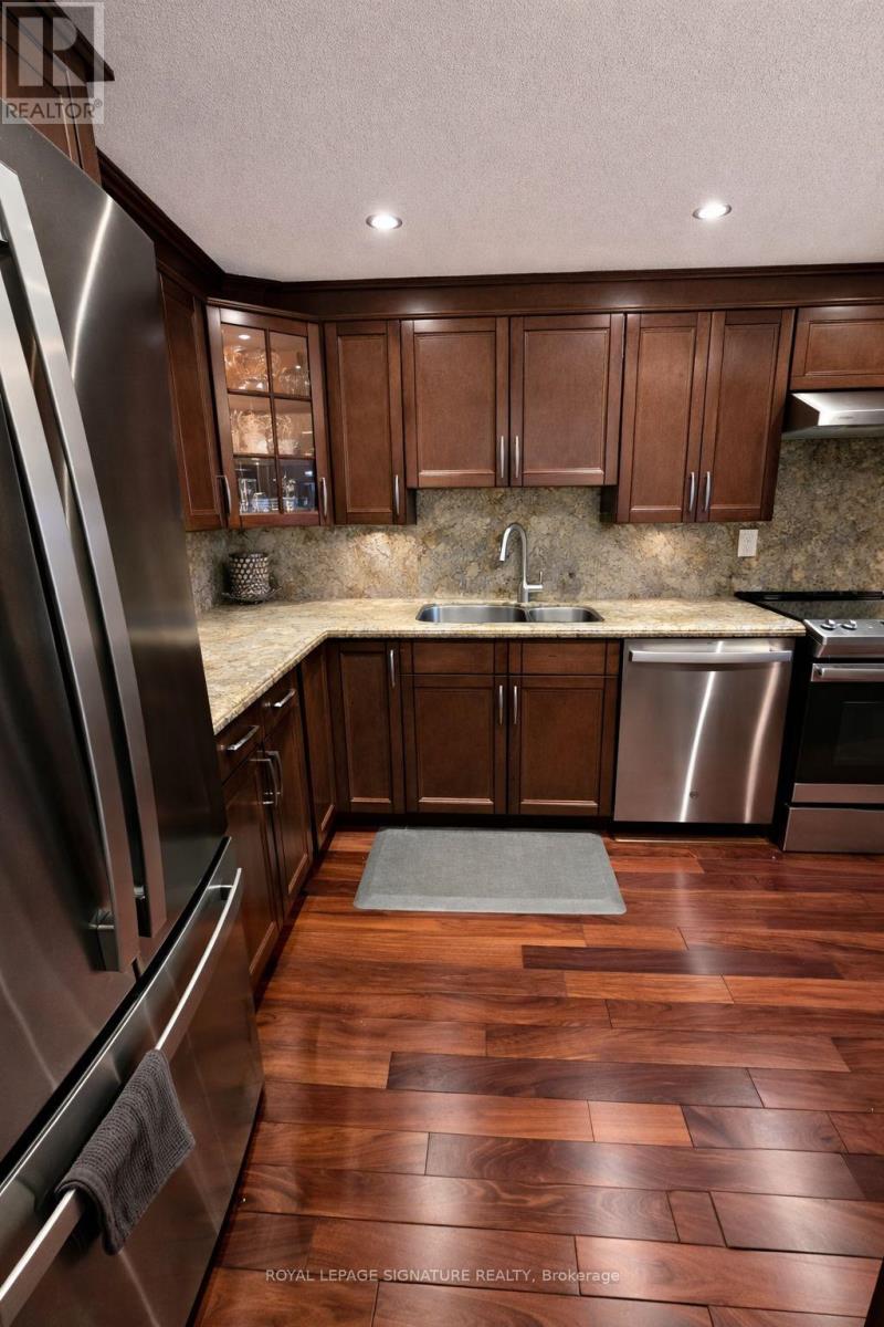 705 - 11 Wincott Drive, Toronto, Ontario  M9R 2R9 - Photo 8 - W12909644