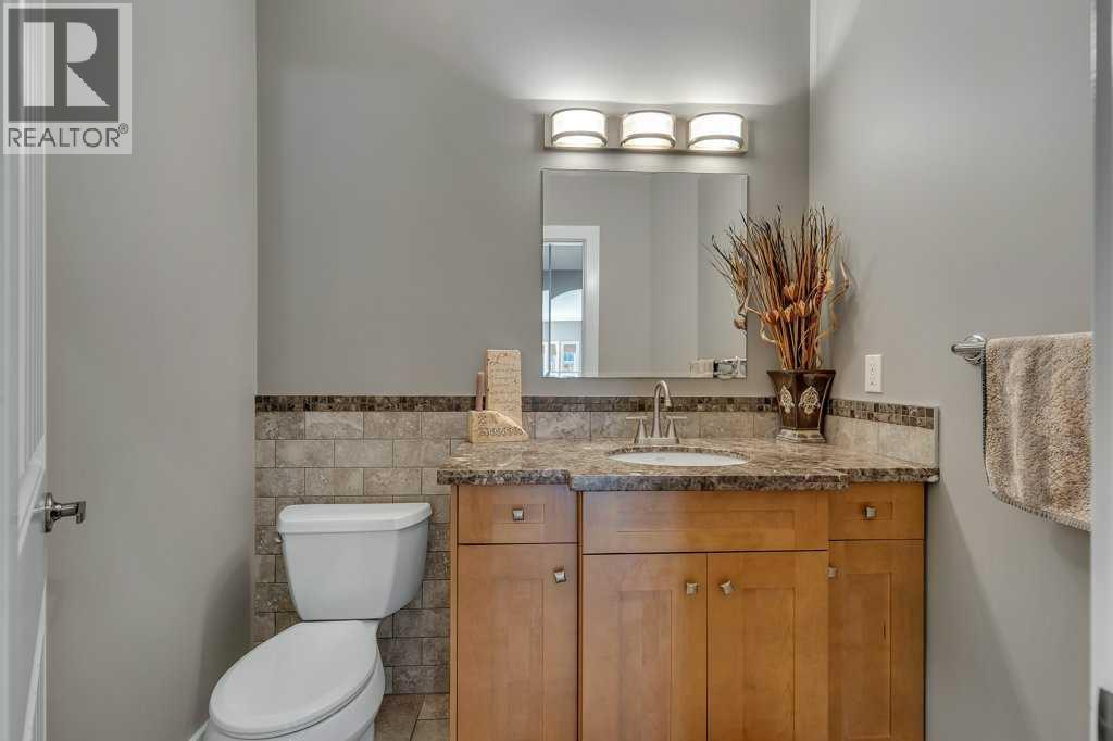 319 Valley Crest Court NW, Calgary, Alberta  T3B 5Y4 - Photo 6 - A2292677