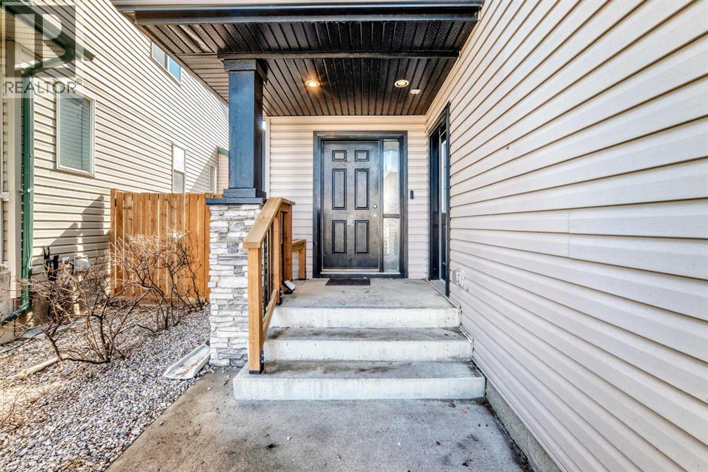 377 Cimarron Boulevard, Okotoks, Alberta  T1S 2L8 - Photo 4 - A2295481