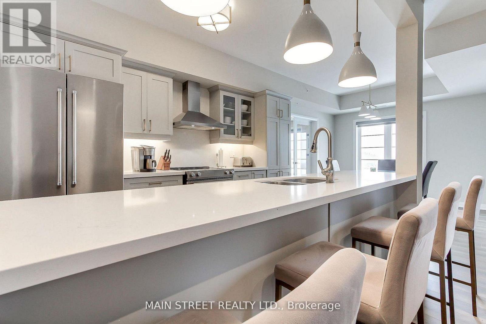 402 - 20 Koda Street, Barrie, Ontario  L9J 0J7 - Photo 12 - S12910018