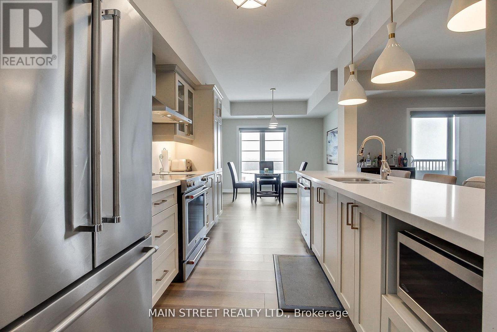 402 - 20 Koda Street, Barrie, Ontario  L9J 0J7 - Photo 13 - S12910018