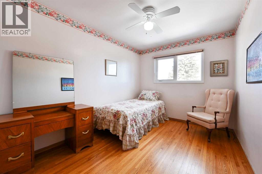 7703 5 Street SW, Calgary, Alberta  T2V 1C1 - Photo 9 - A2289156