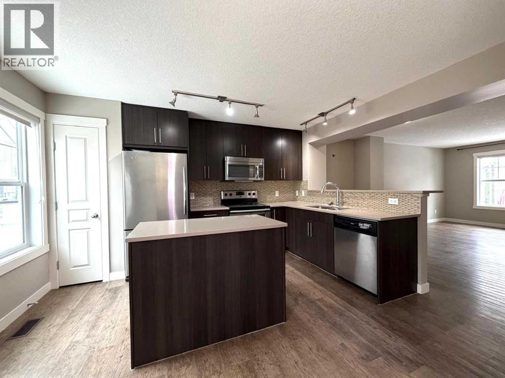 947 Mckenzie Towne Manor Se, Calgary, Alberta  T2Z 1E1 - Photo 5 - A2294726