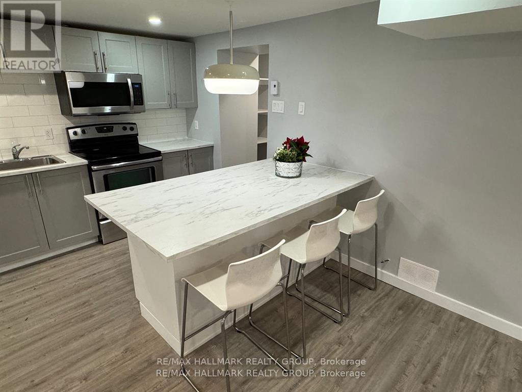 A - 15 Marier Avenue, Ottawa, Ontario  K1L 5S6 - Photo 4 - X12910132