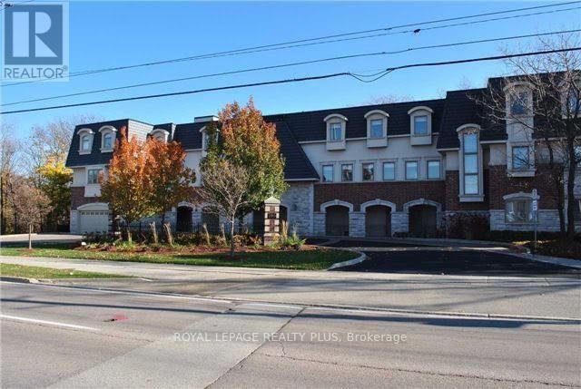 305 - 390 Upper Middle Road E, Oakville, Ontario  L6H 0A5 - Photo 2 - W12910488