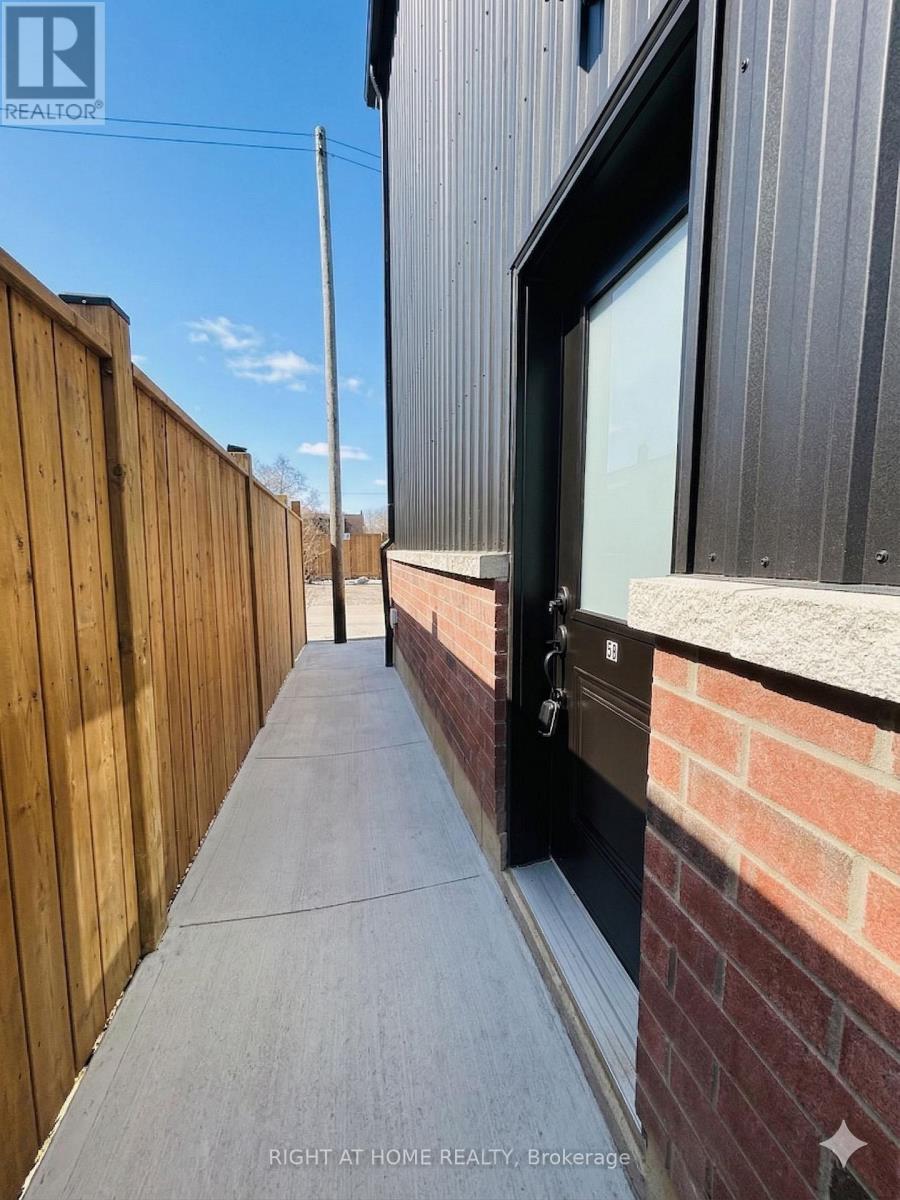 5b - 19 Arrowsmith Avenue, Toronto, Ontario  M6M 2W8 - Photo 3 - W12910554