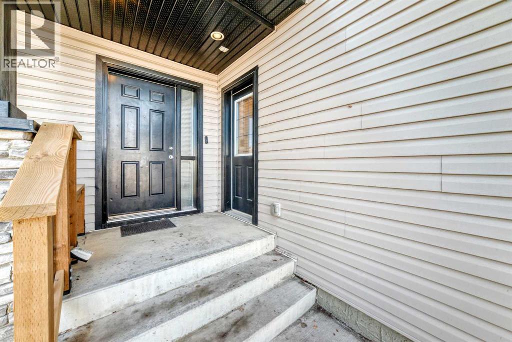 377 Cimarron Boulevard, Okotoks, Alberta  T1S 2L8 - Photo 9 - A2295481