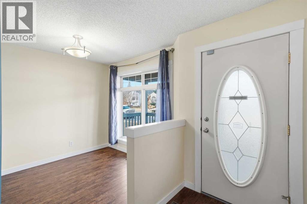 166 Coverton Close, Calgary, Alberta  T3K 4P4 - Photo 4 - A2294445